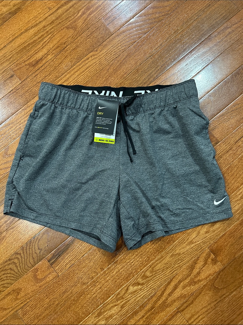 Nike Women's Charcoal Gray Athletic Shorts with Swoosh
